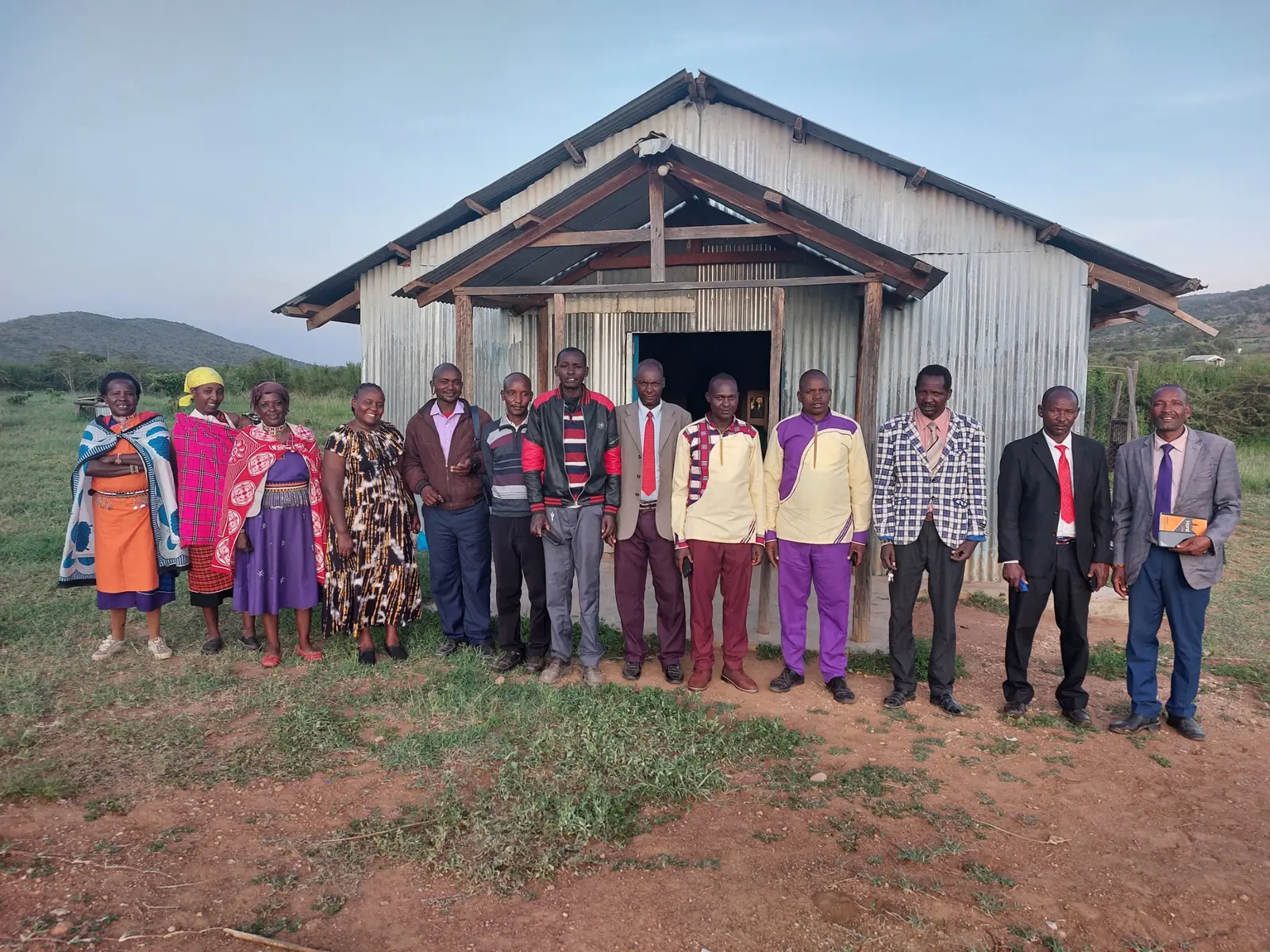 Shakenisho community members and local partners gathered together